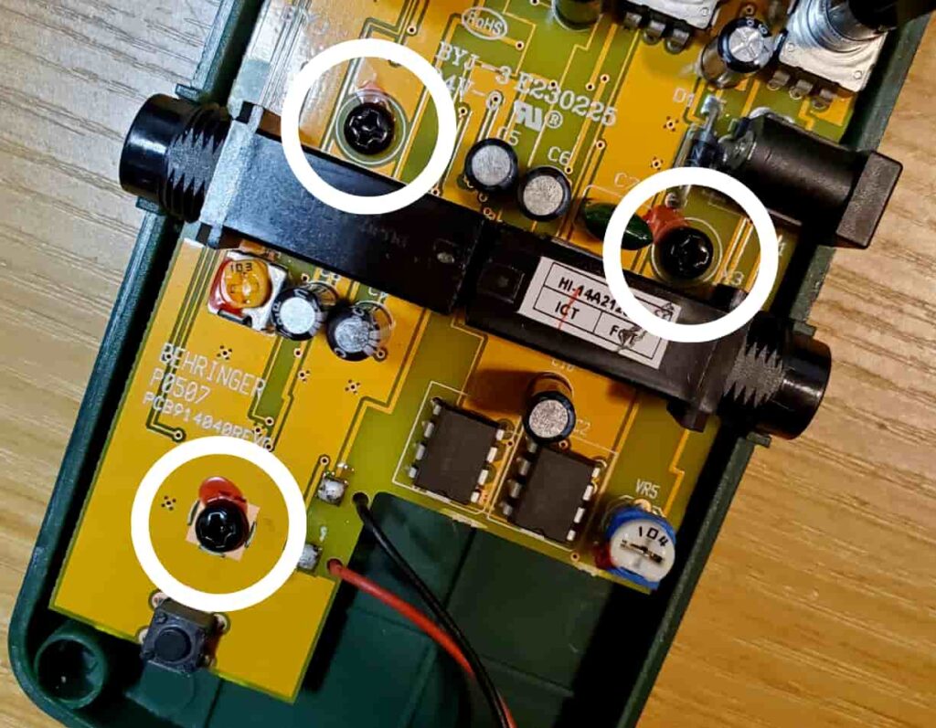 Three screws hold in the circuit board.