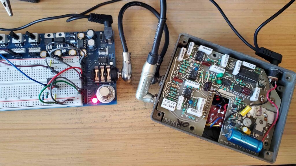 Left: the op amp boost circuit breadboarded on a PROTIS 1 MINI board. Right: the MXR Flanger 117, previously modified for True Bypass as well as for use with an 18Vdc power supply.