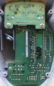 Danelectro Dan-Echo gut shot revealing the metal screws holding in the daughter board and main circuit board.