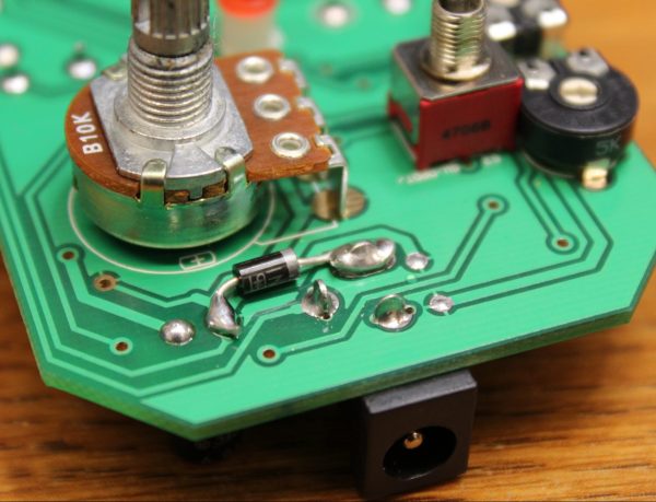 The EHX Bassballs D2 replaced with an 1N4001 diode for polarity protection.