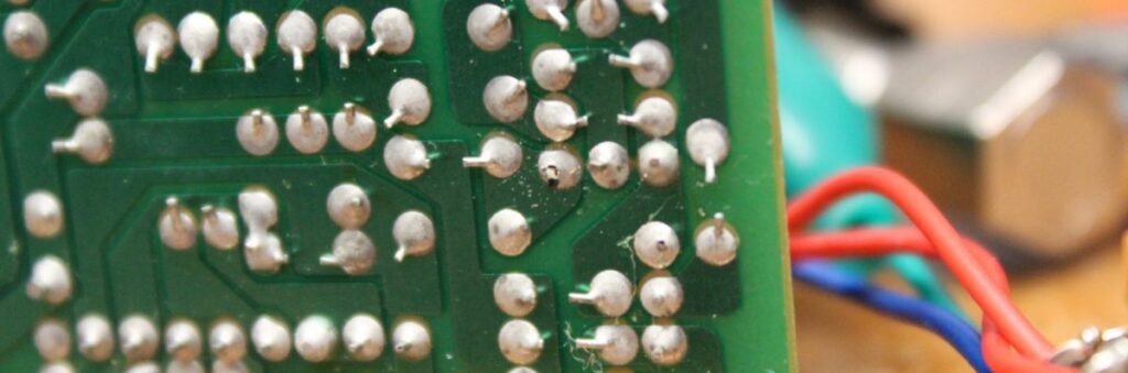 The main board of the BOSS GEB-7, showing the cold solder joint.