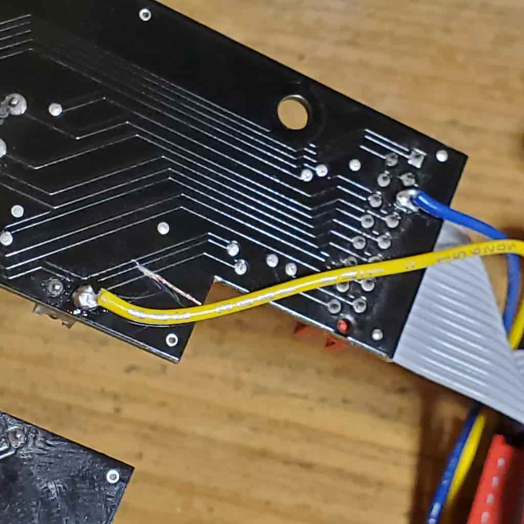 Connecting wires to the LED203 power source.