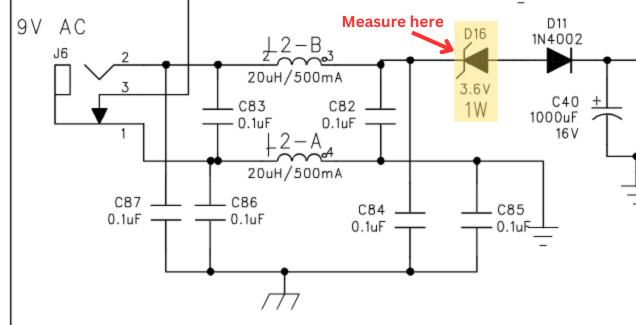 Measure the cathode of the zener diode D16.