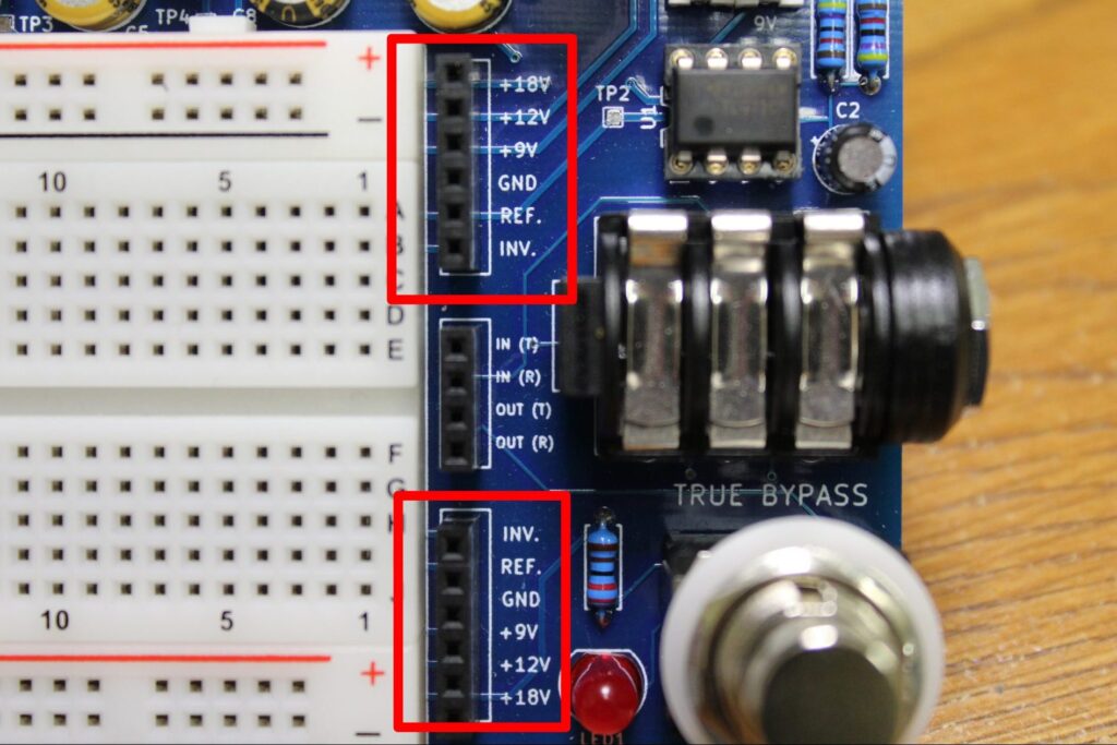 Power headers to the right side of the breadboard on the PROTIS 1 MINI guitar effects development board.